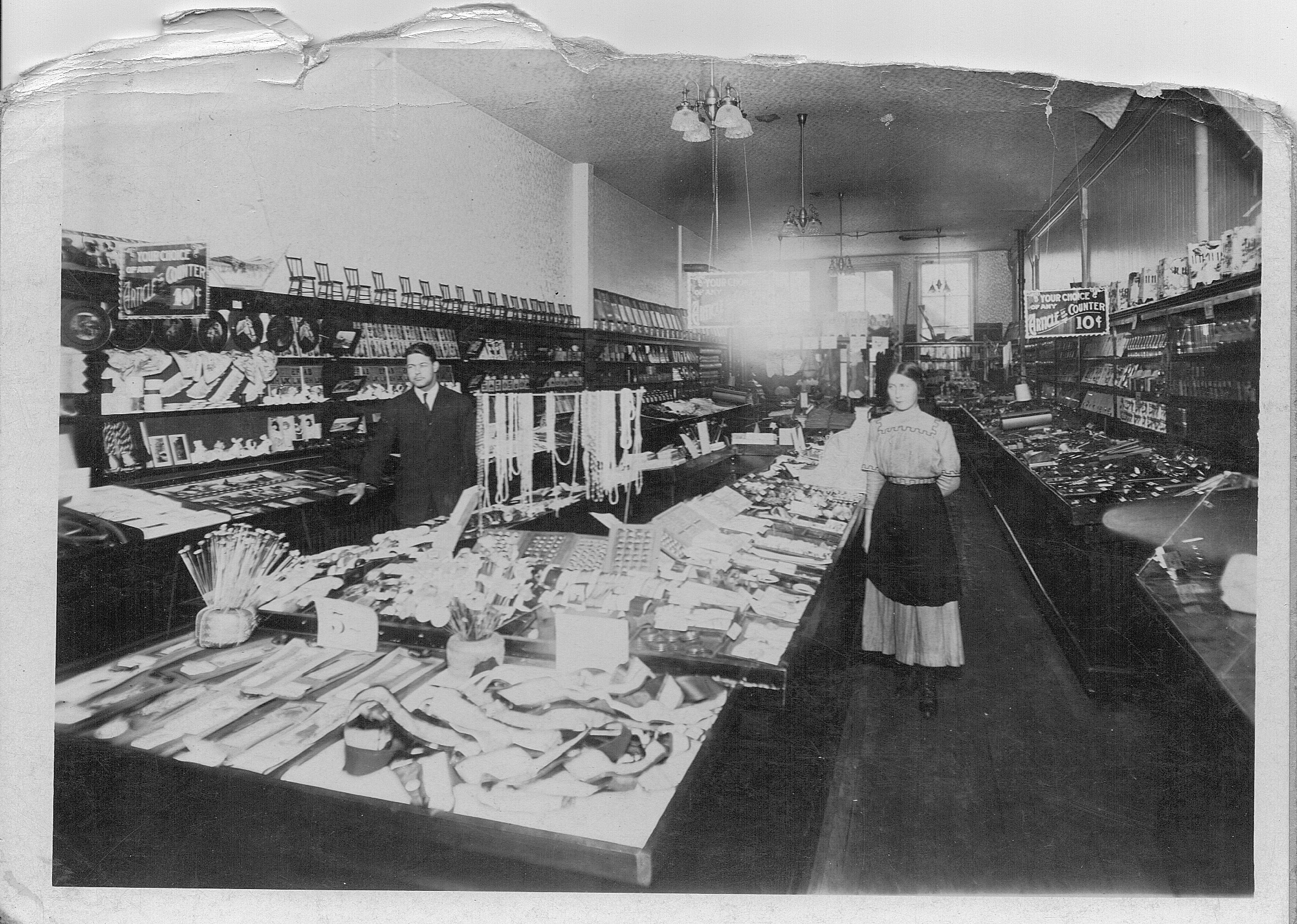 Jim & woman working in the store